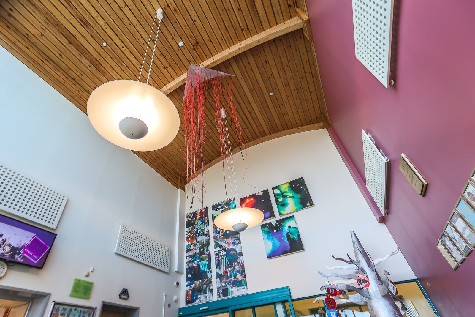 Ceiling view of a reception area of a primary school showing the new light fittings